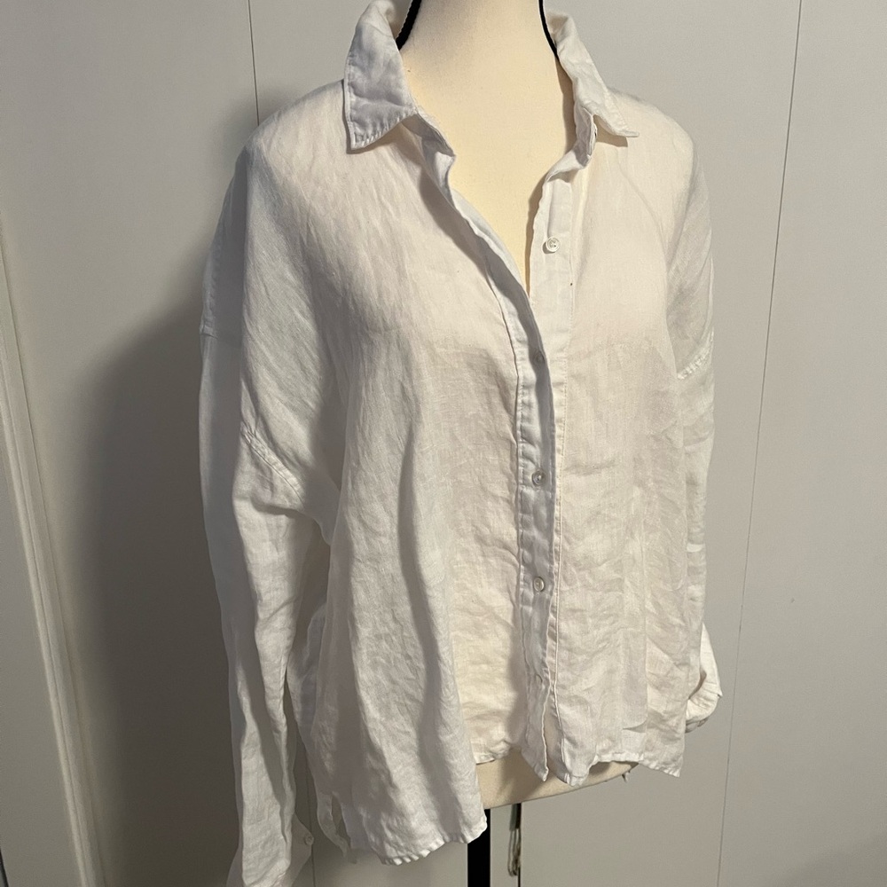 Clean crisp 100% Linen White Shirt with Notched Collar and Long Sleeves.